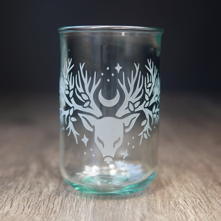 recycled glass cup engraved with a deer head with tree branches for antlers