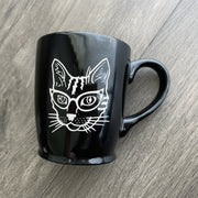 Glasses Cat engraved black mug by Bread and Badger