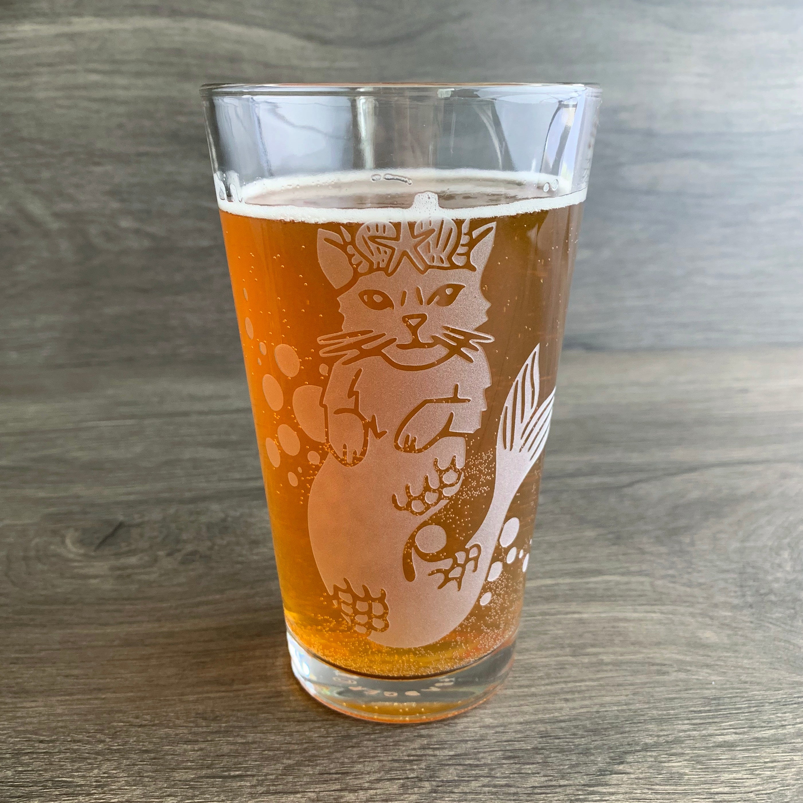 Mermaid Cat engraved pint glass by Bread and Badger