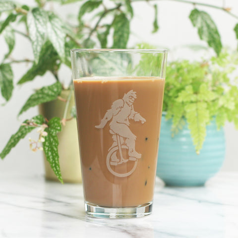 Sasquatch unicycle pint glass by Bread and Badger