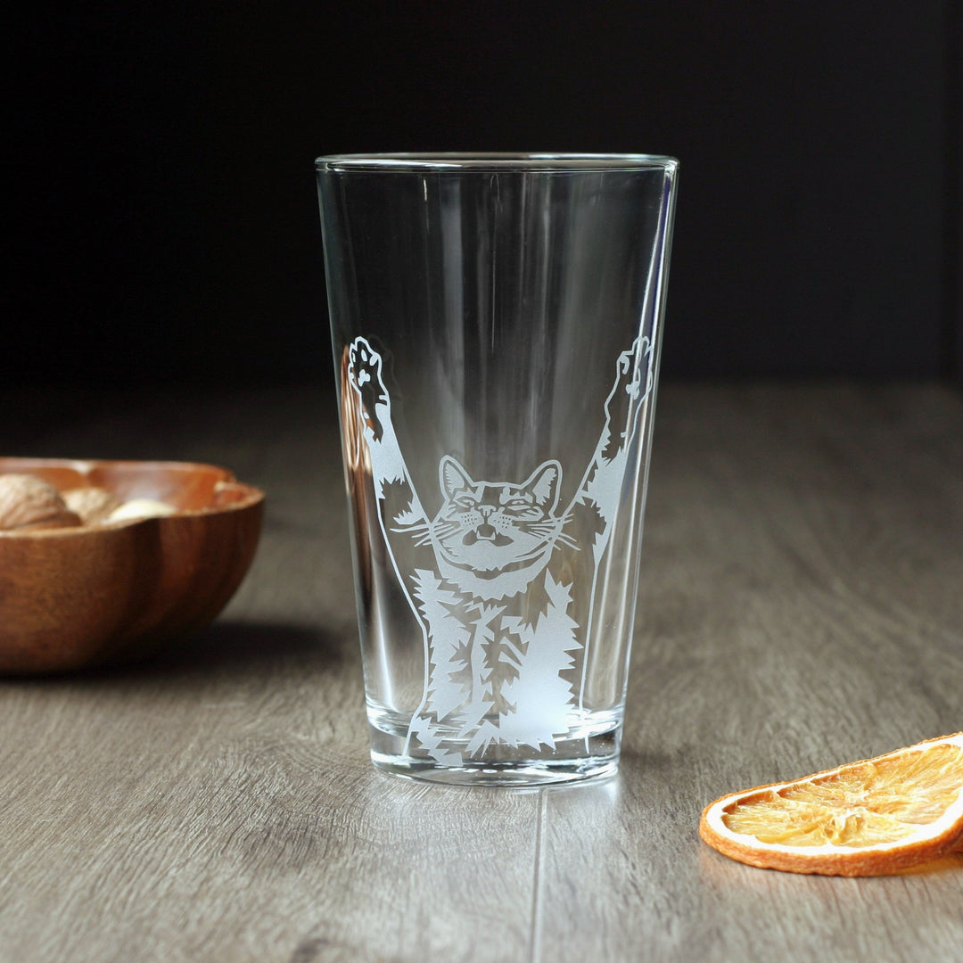 Stretching cat pint glass