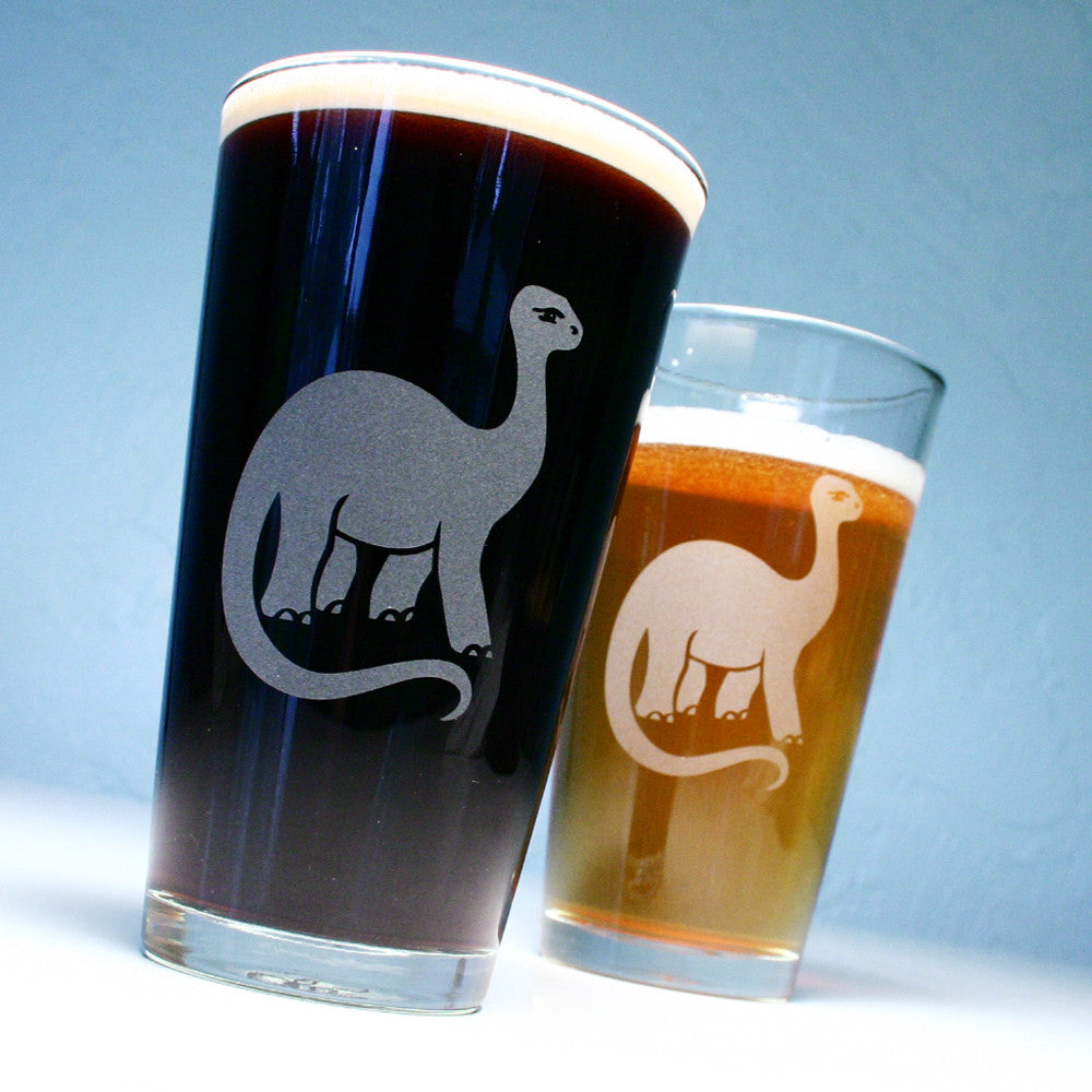 2 brontosaurus dinosaur pint glasses