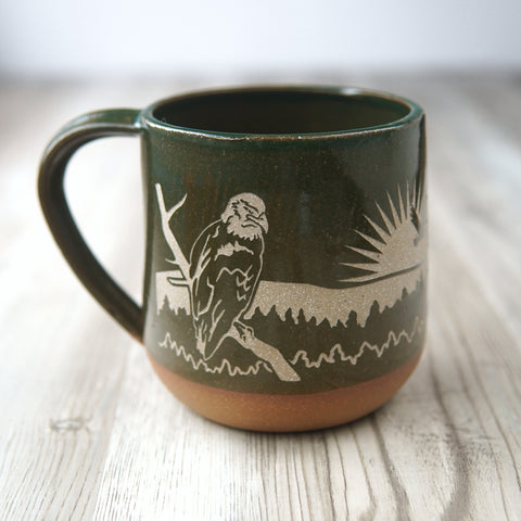 Bald Eagles engraved handmade pottery mug in pine green, left side