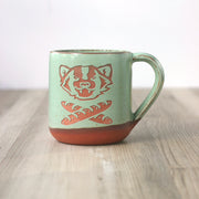 Badger and Baguette Mug - green on red clay pottery