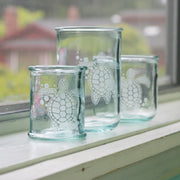 Sea Turtle nautical home decor tumblers made from recycled glass in three sizes for drinking or candle holders.