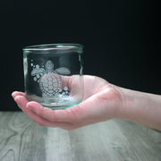 Sea Turtle nautical Short tumbler made from recycled glass, held in a white person's hand
