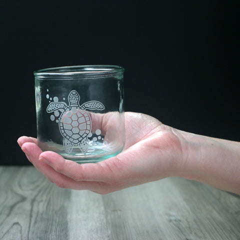 Sea Turtle nautical Short tumbler made from recycled glass, held in a white person's hand