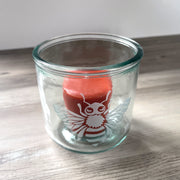 Bee short recycled glass tumbler with a votive candle inside it
