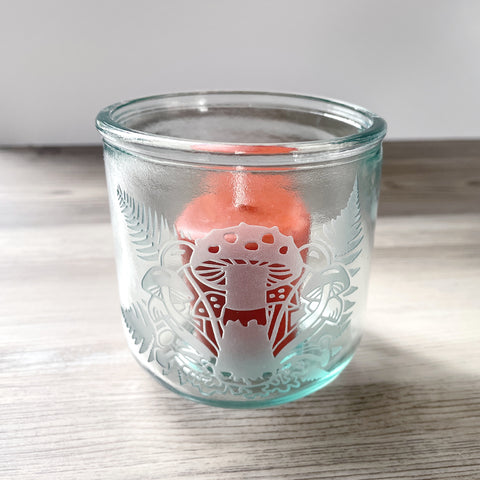 Mushrooms + Ferns short recycled glass tumbler with a votive candle inside